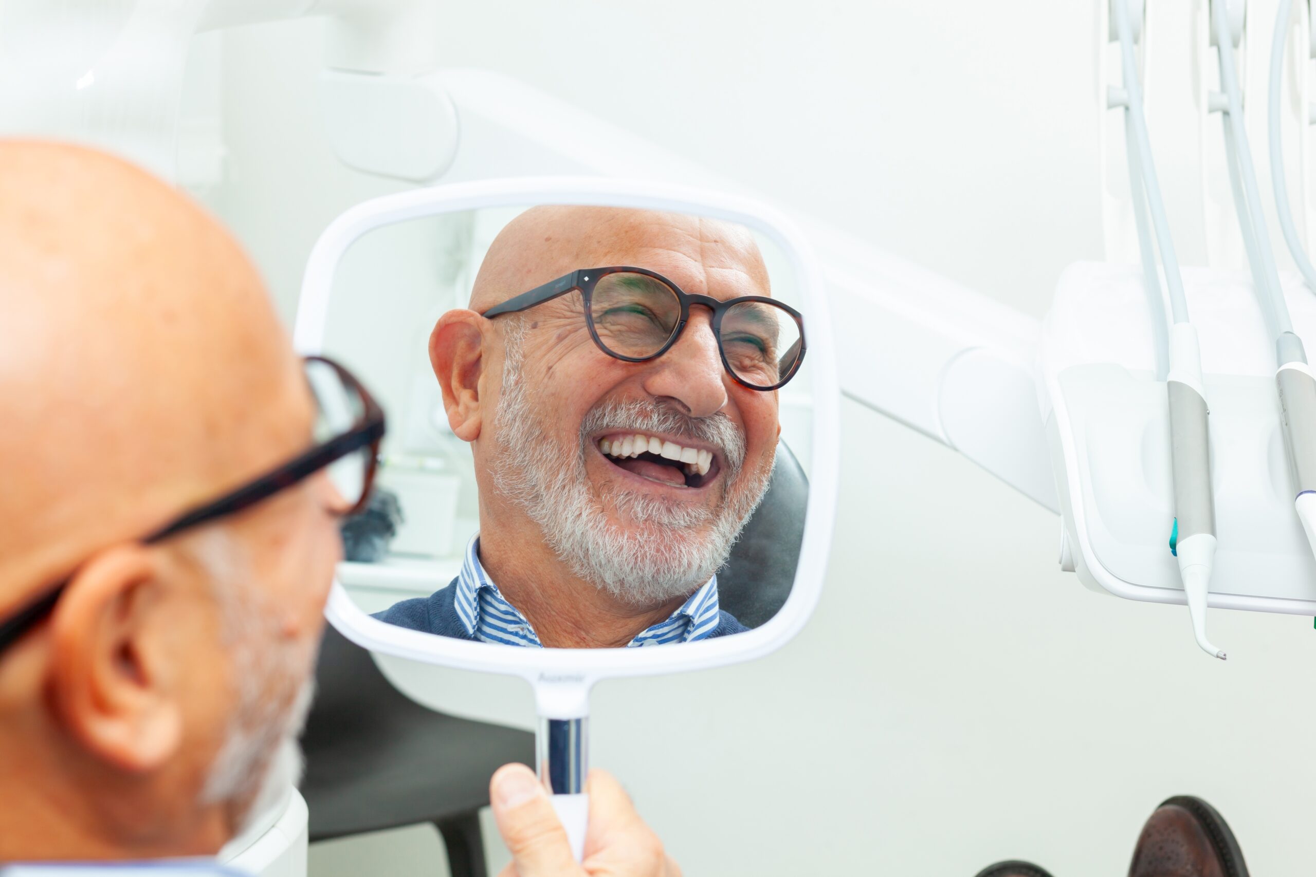 Dental Implants vs. Dentures in Marble Hill, GA: Which Is Right for You?